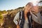 Happy young hiker woman in nature