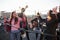 Happy young life. Group of young people having celebration at a rooftop with some alcohol and guitar playing