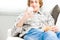 Happy young man relaxing at home on a sofa