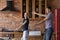 Happy young man with sick wife dance in kitchen