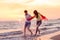 Happy young romantic couple in love have fun on beautiful beach at beautiful summer day