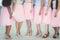 Happy young stylish multiethnic girls having fun during bachelorette bridesmaids party, group of diverse multiracial women dressed