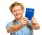 Happy young tourist man holding passport white background