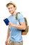 Happy young tourist man holding passport white background