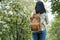 Happy young traveler woman backpacker travel in green natural forest ,greenery fresh air,Freedom wanderlust concept,Alone solo jo