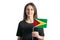 Happy young white girl holding Guyana flag isolated on a white background