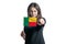 Happy young white woman holding flag of Benin and points forward in front of him isolated on a white background