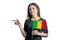 Happy young white woman holding flag Mali and points to the left isolated on a white background