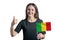 Happy young white woman holding flag of Mali and shows the class by hand isolated on a white background