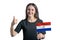 Happy young white woman holding flag of Paraguay and shows the class by hand isolated on a white background