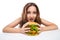 Happy Young Woman Eating big yummy Burger isolated