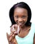 Happy young woman eating a chocolate donut