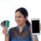 Happy young woman holding debit cards and cellphone