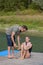 Happy young woman learning water skiing