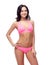 Happy young woman in pink bikini swimsuit