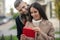 Happy young woman receiving a love letter