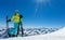 Happy young woman skier enjoying sunny weather in Alps