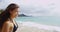 Happy Young Woman With Windswept Hair Standing At Waikiki Beach