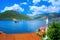 Harbor and ancient buildings in sunny day at Boka Kotor bay Boka Kotorska, Montenegro.