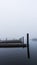 Harbor and boating docks on a misty morning