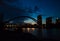 Harbor bridge, river, water reflection and evening sky Toronto, Canada