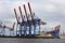 Harbor Cargo Freight Container Shipping Cranes in Hamburg Harbor for global Logistics Burchardkai