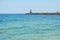 Harbor entrance at the sea port lighthouse, copy space - Tunisia, Sousse, El Kantaoui 06 19 2019