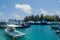 Harbor full of small fishermen`s and cargo boats located at the Villingili tropical island