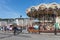 Harbor of historic French city Honfleur with carrousel for children