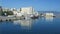 Harbor of Iraklion on Crete Greece. Ships and boats in the harbor right next to the historical town part of Iraklion with its fo