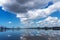 Harbor Low Tide with Cloudy Blue Sky Reflections