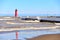 The Harbor Markers at Kenosha, Wisconin in Winter with Large Wave Actions