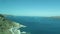 Harbor Ormos Athinios at Santorini Isle Greece. Aerial view over the Calders with its volcano isle Nea Kameni