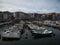 Harbor port waterfront sailing boats fishermen ships historic architecture in Lekeitio Biscay Basque Country Spain