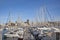 Harbor with sailing boats in Marseilles with view to the promenade of the old town