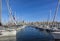 harbor with sailing boats in Marseilles with view to the promenade of the old town