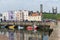 Harbor with ships and skyline with cathedral St Andrews, Scotland