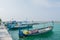 Harbor with small fishermen`s boats located at the tropical island Villingili