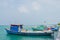 Harbor with small fishermen`s boats at the Villingili island