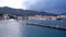 Harbor at small Italian Town Porto Ercole. Fishing boat entering port