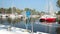 Harbor on summer day, moored sailboats in dock, yachting