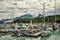 Harbor in town of Valdez with Alaskan mountains in background