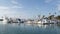 Harbor village, yachts sailboats in marina. Nautical vessels in sea port. Oceanside, California USA