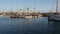 Harbor village, yachts sailboats in marina. Nautical vessels in sea port. Oceanside, California USA