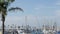 Harbor village, yachts sailboats in marina. Nautical vessels in sea port. Oceanside, California USA