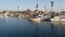 Harbor village, yachts sailboats in marina. Nautical vessels in sea port. Oceanside, California USA.