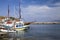 The harbor wharf in Hersonissos, Crete. Port with fishing boats.
