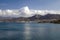 The harbor wharf in Hersonissos, Crete. Port with fishing boats and sailing boats on the Greek island.