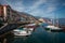 Harbour and boardwalk with colorful houses of Cannobio at Lago Maggiore in Italy