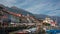 Harbour and boardwalk with colorful houses of Cannobio at Lago Maggiore in Italy